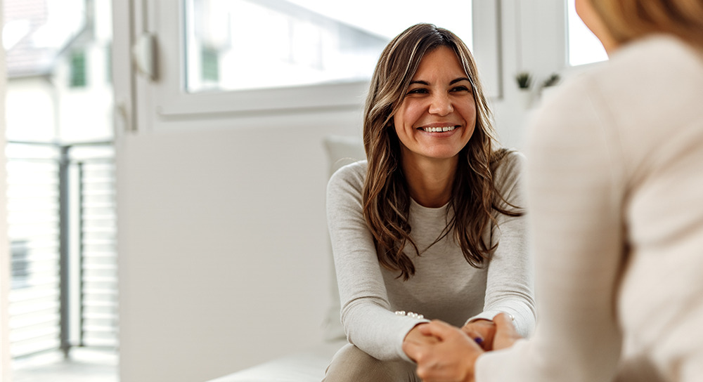 woman smiling at therapist