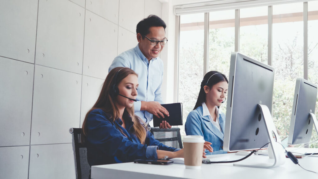 Implementing an EHR: employees working and using computers